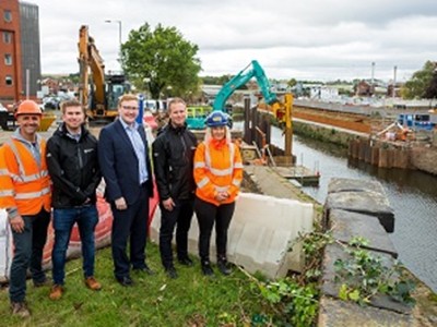 Work begins on flood barrier